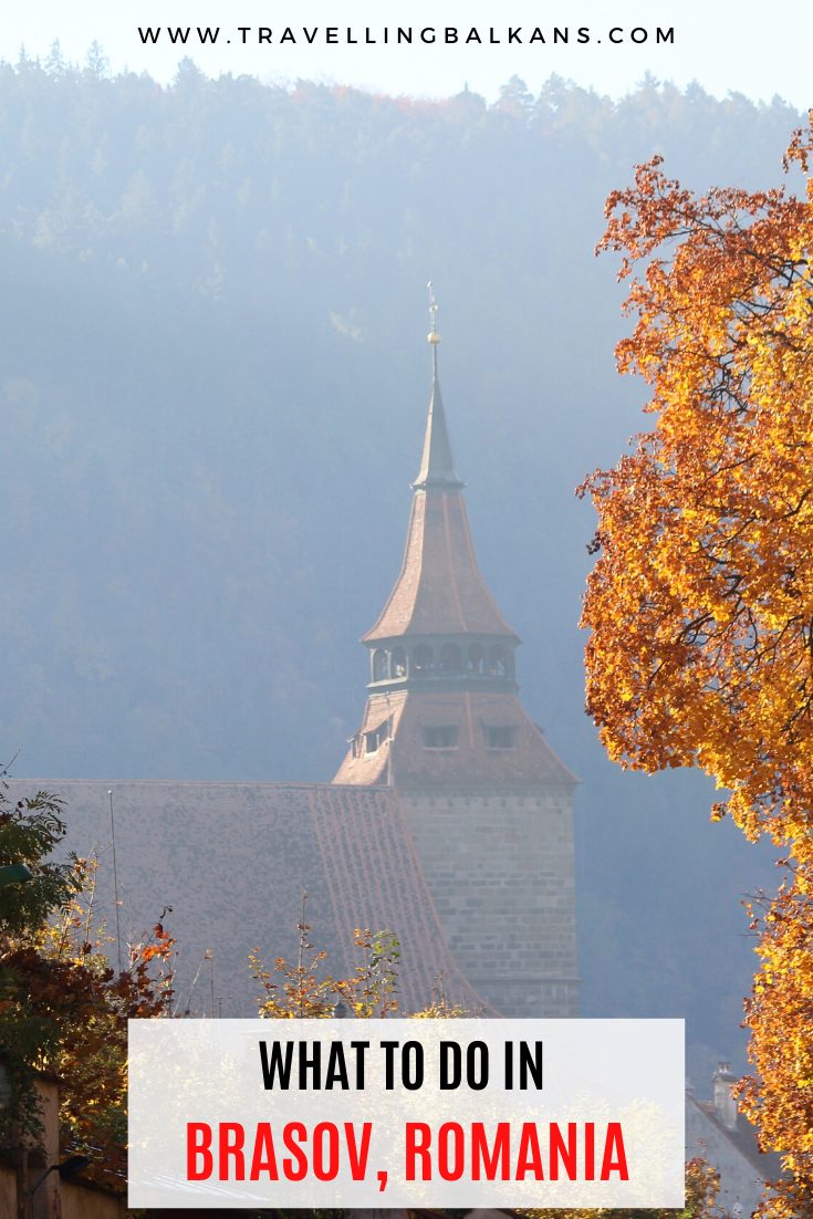 Pinterest graphic with the Black Church in Brasov partially obscured by autumn trees, and text reading “What to Do in Brasov, Romania.”